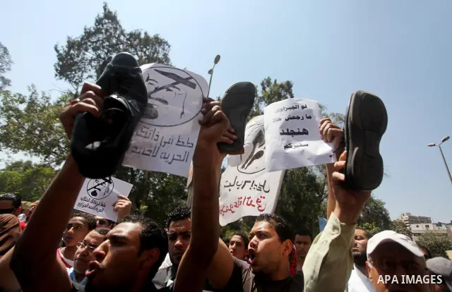 Egyptian protesters take part in a demonstration in front of the Saudi Arabian embassy in Cairo on April 24, 2012, calling for the release of Egyptians who have been detained in the kingdom, including Ahmed Al-Gizawi who...