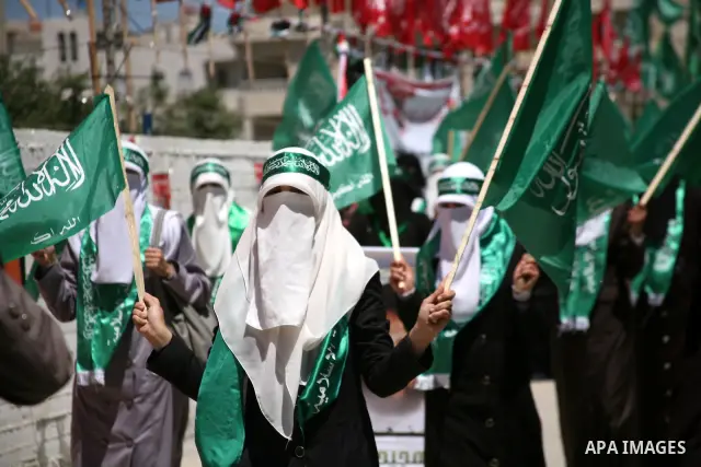 Palestinian students supporters of the Islamic group Hamas, seen during Palestine Polytechnic University. Students Council elections campaign at the Palestine Polytechnic University in the West Bank city of Hebron on Apr...