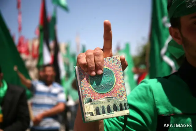 Palestinian students supporters of the Islamic group Hamas, seen during Palestine Polytechnic University. Students Council elections campaign at the Palestine Polytechnic University in the West Bank city of Hebron on Apr...