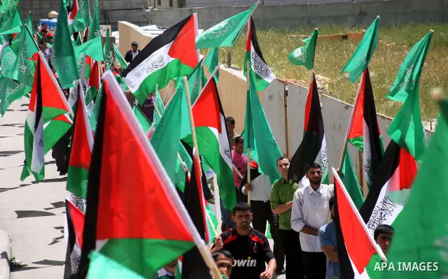 Palestinian students supporters of the Islamic group Hamas, seen during Palestine Polytechnic University. Students Council elections campaign at the Palestine Polytechnic University in the West Bank city of Hebron on Apr...