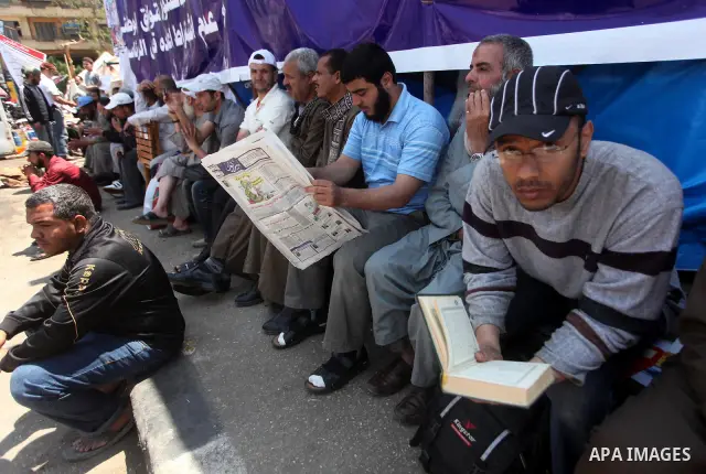 Egyptian demonstrators during a protest at Tahrir Square in Cairo, Egypt on April 25, 2012. Several thousand Egyptians are protesting against the country's military rulers. Photo by Ashraf Amra