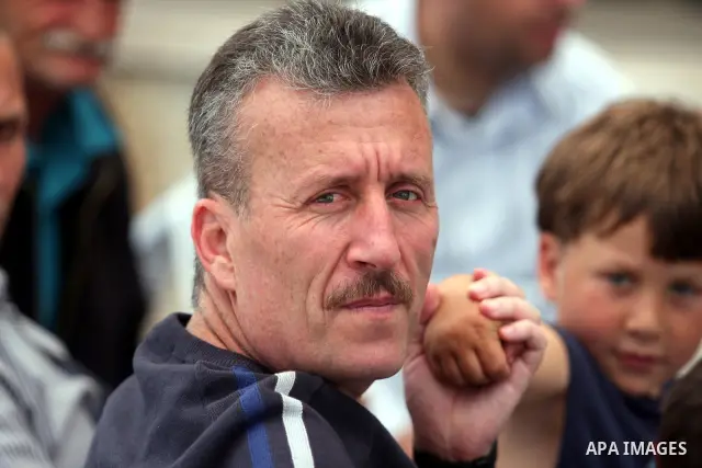 Palestinian activist Bassem Tamimi with his relatives at a hospital in Ramallah on April 25, 2012, after a military court released him on bail on April 24, ahead of the verdict in his trial on charges of organising popul...