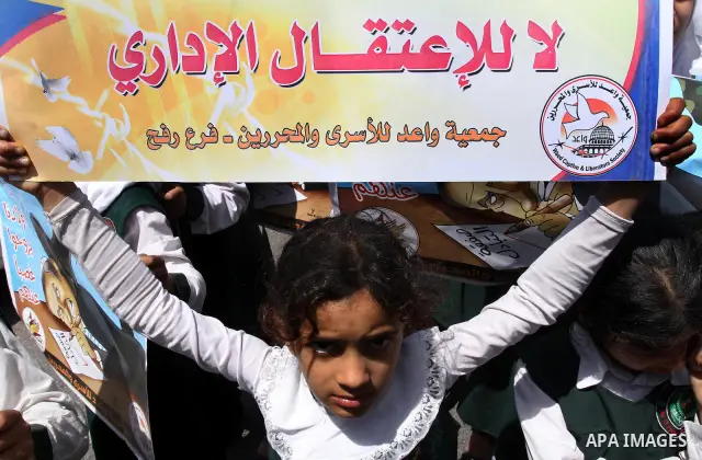 Palestinian students shout slogans during a demonstration for the release of Palestinian prisoners held in Israeli jails in front of the Red Cross offices in Gaza City on April 26, 2012. At least 1,350 Palestinian prison...