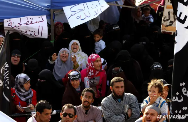 Supporters of Salafist leader and former presidential candidate Hazem Salah Abu Ismail, chant slogans against the country's military rulers during a sit-in at Tahrir Square in Cairo, April 26, 2012. Egypt's election comm...