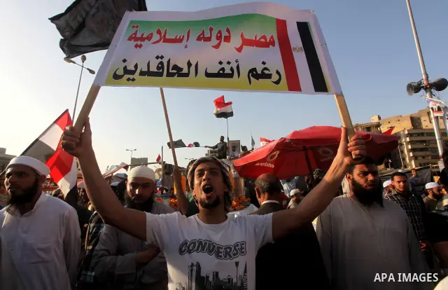 Supporters of Salafist leader and former presidential candidate Hazem Salah Abu Ismail, chant slogans against the country's military rulers during a sit-in at Tahrir Square in Cairo, April 26, 2012. Egypt's election comm...