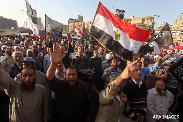 Supporters of Salafist leader and former presidential candidate Hazem Salah Abu Ismail, chant slogans against the country's military rulers during a sit-in at Tahrir Square in Cairo, April 26, 2012. Egypt's election comm...