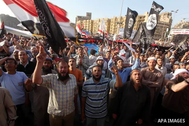 Supporters of Salafist leader and former presidential candidate Hazem Salah Abu Ismail, chant slogans against the country's military rulers during a sit-in at Tahrir Square in Cairo, April 26, 2012. Egypt's election comm...