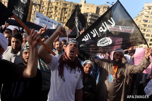 Supporters of Salafist leader and former presidential candidate Hazem Salah Abu Ismail, chant slogans against the country's military rulers during a sit-in at Tahrir Square in Cairo, April 26, 2012. Egypt's election comm...
