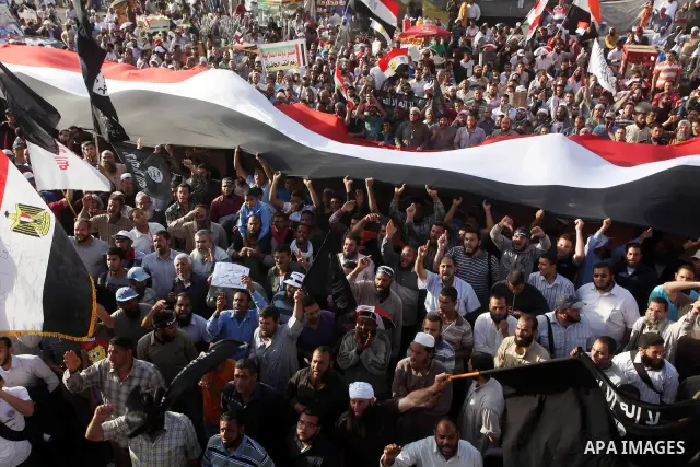 Supporters of Salafist leader and former presidential candidate Hazem Salah Abu Ismail, chant slogans against the country's military rulers during a sit-in at Tahrir Square in Cairo, April 26, 2012. Egypt's election comm...