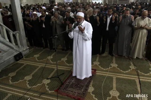 Palestinian Prime Minister in Gaza Ismail Hania, attend by Legislative Council members, Ministers and Clerics in Gaza, during a prayer for the prisoners in Israeli jails. in Gaza city on April 26, 2012.. Photo by Mohamme...