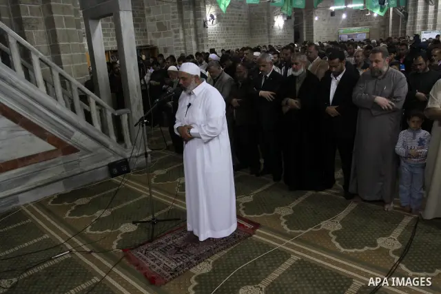 Palestinian Prime Minister in Gaza Ismail Hania, attend by Legislative Council members, Ministers and Clerics in Gaza, during a prayer for the prisoners in Israeli jails. in Gaza city on April 26, 2012.. Photo by Mohamme...
