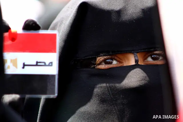 People attend Friday prayers in Tahrir Square in Cairo April 27, 2012. Tens of thousands of Egyptians demanded on Friday that their military rulers stick to a pledge to hand over power by mid-year after a row over who ca...