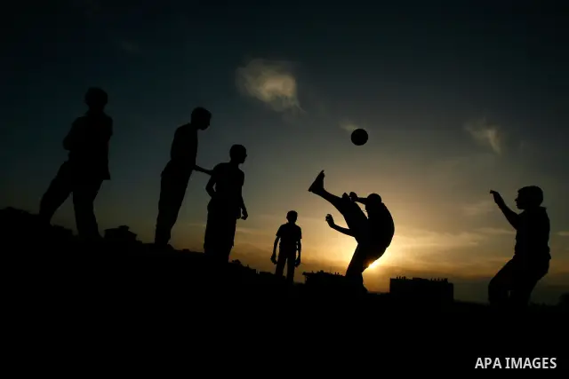 Palestinian boys play near Rafah border crossing, between the southern Gaza Strip and Egypt on April 28, 2012. Photo by Eyad Al Baba