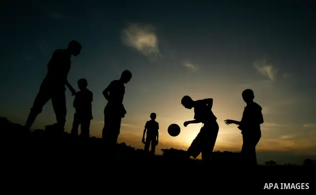 Palestinian boys play near Rafah border crossing, between the southern Gaza Strip and Egypt on April 28, 2012. Photo by Eyad Al Baba