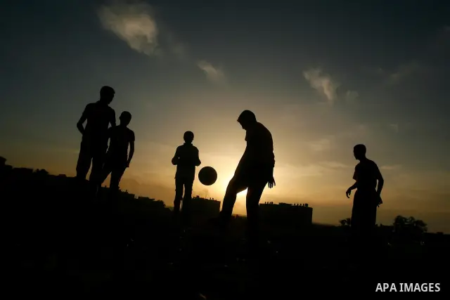 Palestinian boys play near Rafah border crossing, between the southern Gaza Strip and Egypt on April 28, 2012. Photo by Eyad Al Baba