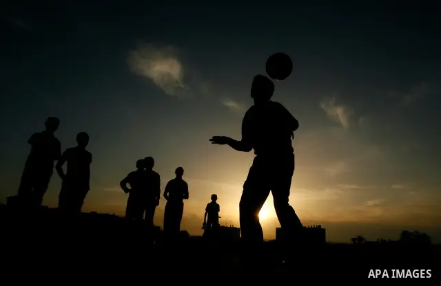 Palestinian boys play near Rafah border crossing, between the southern Gaza Strip and Egypt on April 28, 2012. Photo by Eyad Al Baba