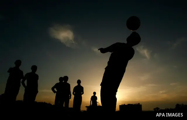 Palestinian boys play near Rafah border crossing, between the southern Gaza Strip and Egypt on April 28, 2012. Photo by Eyad Al Baba