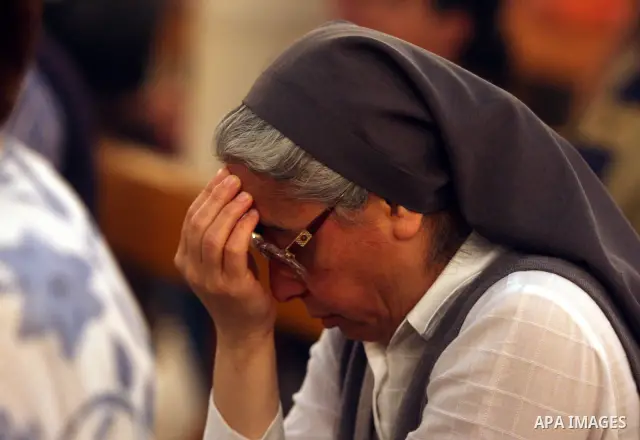 Palestinian Christians attend a special service in support of jailed Palestinians on hunger strike in Israeli prisons at a church in the West Bank city of Ramallah on April 29, 2012. Over the past week, Over 1,350 Palest...