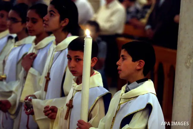 Palestinian Christians attend a special service in support of jailed Palestinians on hunger strike in Israeli prisons at a church in the West Bank city of Ramallah on April 29, 2012. Over the past week, Over 1,350 Palest...