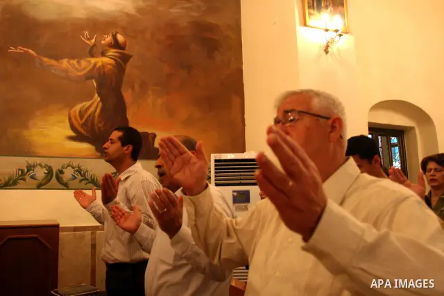 Palestinian Christians attend a special service in support of jailed Palestinians on hunger strike in Israeli prisons at a church in the West Bank city of Ramallah on April 29, 2012. Over the past week, Over 1,350 Palest...