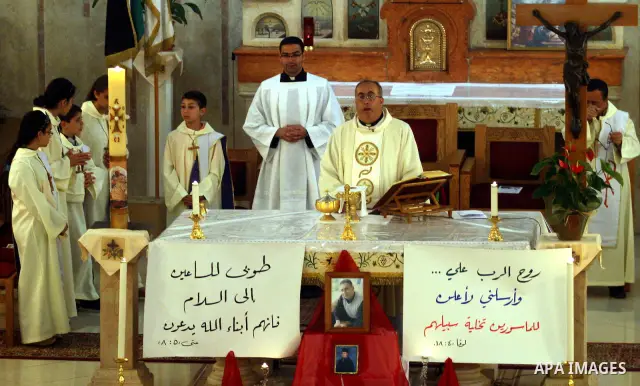 Palestinian Christians attend a special service in support of jailed Palestinians on hunger strike in Israeli prisons at a church in the West Bank city of Ramallah on April 29, 2012. Over the past week, Over 1,350 Palest...
