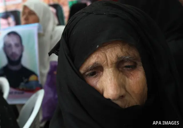 Palestinian women shout slogans during a demonstration for the release of Palestinian prisoners held in Israeli jails in Gaza City on April 30, 2012. At least 1,350 Palestinian prisoners being held in Israel are observin...