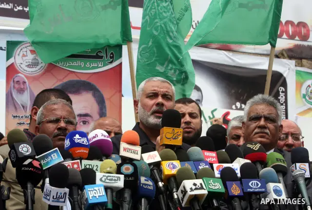Palestinian Prime minister in Gaza Ismail Haniyeh speaks during Sit-in tent to show solidarity with Palestinians prisoners held in Israeli jails in Gaza City on April 30, 2012. At least 1,350 Palestinian prisoners being...