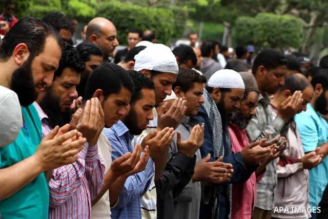 Egyptian Protesters pray near the Ministry of Defense in the Abbassiya district of Cairo April 30, 2012. Protesters continued their sit-in on April 30 after they were attacked two days earlier, which resulted in the deat...