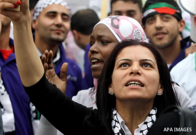 Palestinian workers shouting and calling Palestinian government to improve conditions of workers and create jobs during a protest in the West Bank city of Nablus on May 01,2012. Photo by Nedal shtieh