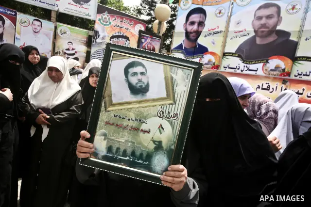 Palestinians attend a rally to show solidarity with Palestinians prisoners held in Israeli jails, in Gaza City, May 01, 2012. Human rights groups say up to 2,000 prisoners have joined an open-ended hunger strike to prote...