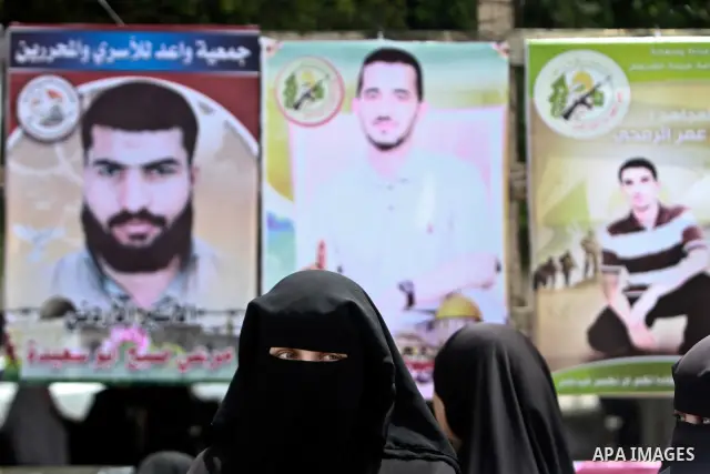 Palestinians attend a rally to show solidarity with Palestinians prisoners held in Israeli jails, in Gaza City, May 01, 2012. Human rights groups say up to 2,000 prisoners have joined an open-ended hunger strike to prote...