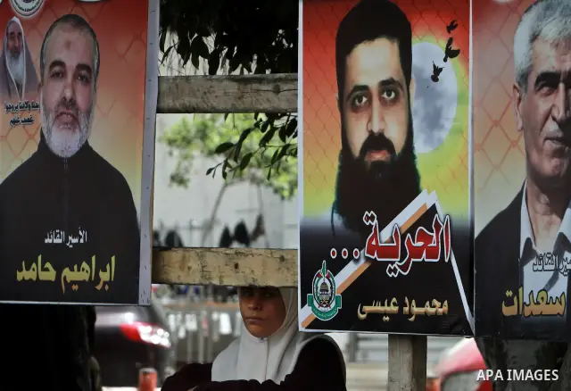 Palestinians attend a rally to show solidarity with Palestinians prisoners held in Israeli jails, in Gaza City, May 01, 2012. Human rights groups say up to 2,000 prisoners have joined an open-ended hunger strike to prote...