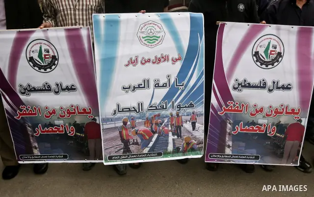 Palestinians attend a rally to show solidarity with Palestinians prisoners held in Israeli jails, in Gaza City, May 01, 2012. Human rights groups say up to 2,000 prisoners have joined an open-ended hunger strike to prote...