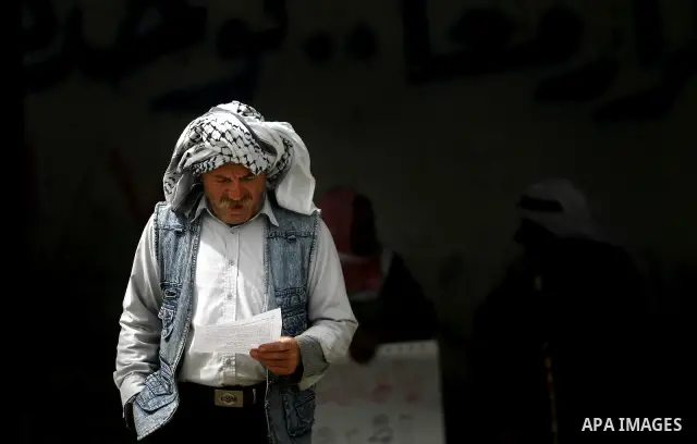 A Palestinian man participates a protest to mark "workers' Day" in Rafah town In Gaza Strip, on May 01, 2012. Photo by Eyad Al Baba