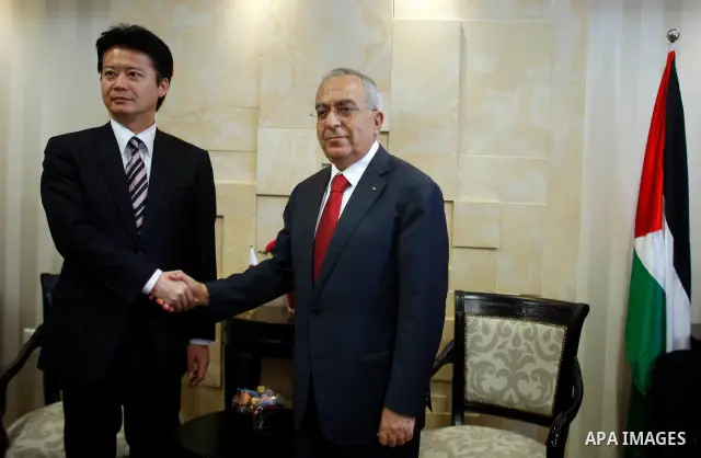 Palestinian Prime Minister Salam Fayyad, meets with Japanese Foreign Minister Koichiro Gemba, in the West Bank City of Ramallah, on May 02, 2012. Photo by Issam Rimawi