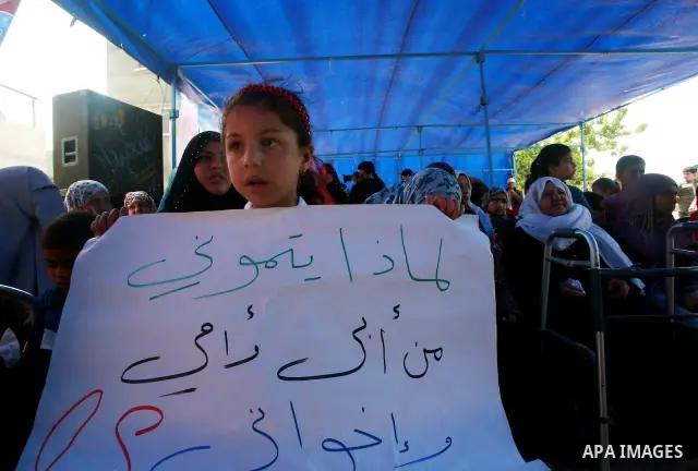 Palestinian Children of Al-Samuni family, protests against the Israeli military has decided on Tuesday, May 1, 2012 not to file any charges in one of the gravest incidents in its 2009 war in the Gaza Strip, closing its i...
