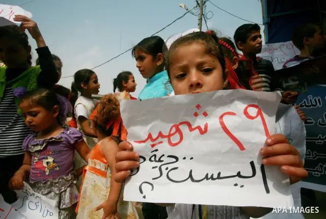 Palestinian Children of Al-Samuni family, protests against the Israeli military has decided on Tuesday, May 1, 2012 not to file any charges in one of the gravest incidents in its 2009 war in the Gaza Strip, closing its i...