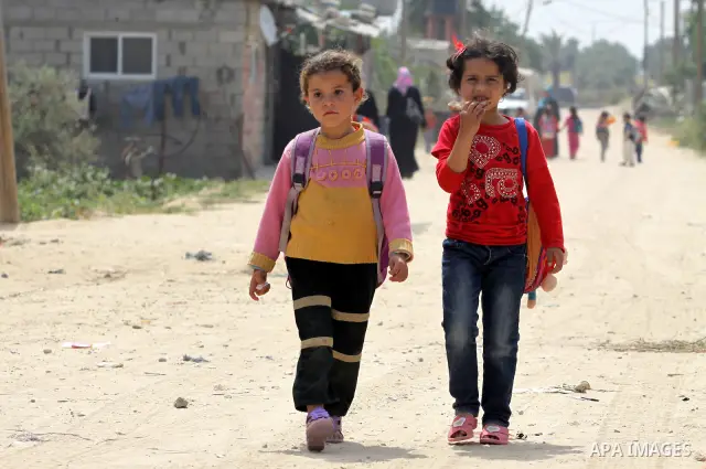 Palestinian Children of Al-Samuni family, leav there schools in Gaza City, on May 03, 2012. the Israeli military has decided on Tuesday, May 1, 2012 not to file any charges in one of the gravest incidents in its 2009 war...