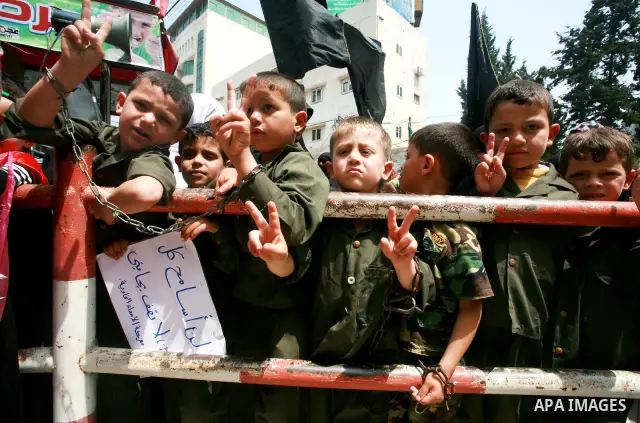 Palestinian Children chant slogans during a rally in Gaza City in support of more than a thousand prisoners who are on an open-ended hunger strike in Israeli jails on May 3, 2012. At least 1,550 Palestinians in Israeli j...