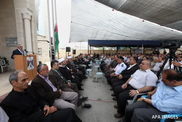 Palestinian Prime Minister Salam Fayyad, offers the condolences on the death of the Governor of Jenin, in the West Bank City of Ramallah, on May 03, 2012. Photo by Mustafa Abu Dayeh