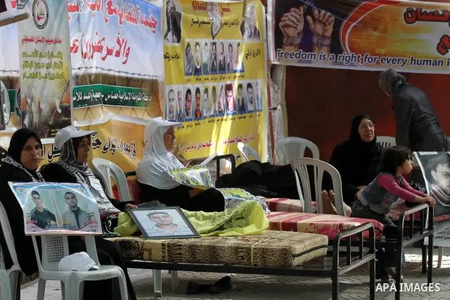Palestinians participat at hunger striking during a sit-in tent held by Palestinian released prisoners, solidarity with Palestinian prisoners held in Israeli jails, in Gaza City on May 3, 2012. Over the past week, Over t...