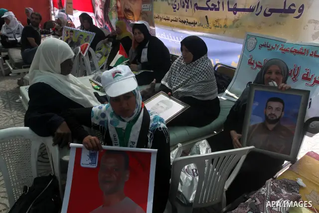 Palestinians participat at hunger striking during a sit-in tent held by Palestinian released prisoners, solidarity with Palestinian prisoners held in Israeli jails, in Gaza City on May 3, 2012. Over the past week, Over t...