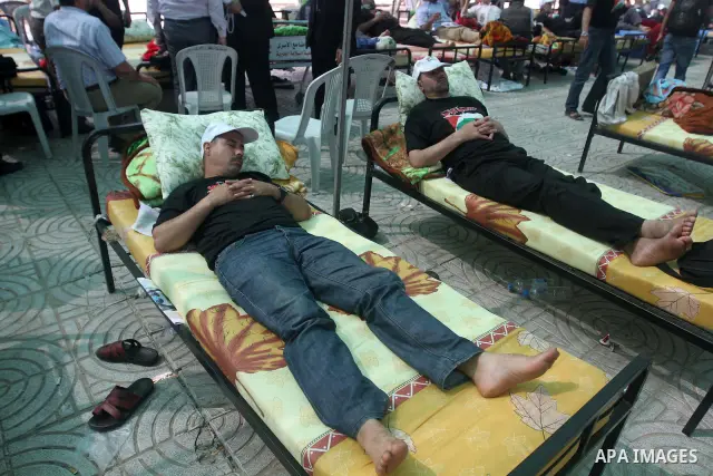 Palestinians participat at hunger striking during a sit-in tent held by Palestinian released prisoners, solidarity with Palestinian prisoners held in Israeli jails, in Gaza City on May 3, 2012. Over the past week, Over t...
