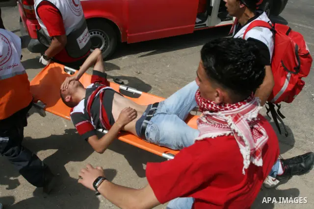 Palestinians demonstrator injured during clashes next to the Israeli military prison of Ofer, near Beitunia, West Bank, 02 May 2012. following a demonstration in solidarity with Palestinian prisoners held in Israeli jail...