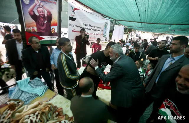 Palestinian Prime Minister in Gaza Ismail Hanyeh, visits Palestinians participat at hunger striking during a sit-in tent held by Palestinian released prisoners, solidarity with Palestinian prisoners held in Israeli jails...