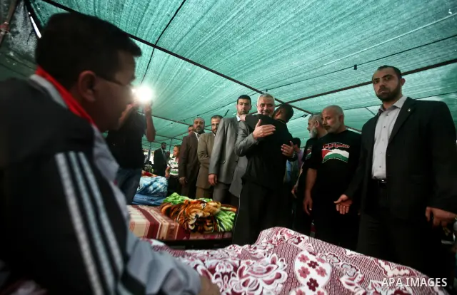 Palestinian Prime Minister in Gaza Ismail Hanyeh, visits Palestinians participat at hunger striking during a sit-in tent held by Palestinian released prisoners, solidarity with Palestinian prisoners held in Israeli jails...