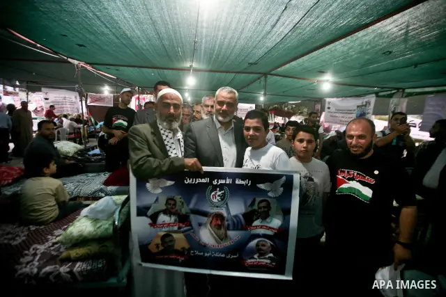 Palestinian Prime Minister in Gaza Ismail Hanyeh, visits Palestinians participat at hunger striking during a sit-in tent held by Palestinian released prisoners, solidarity with Palestinian prisoners held in Israeli jails...