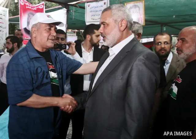 Palestinian Prime Minister in Gaza Ismail Hanyeh, visits Palestinians participat at hunger striking during a sit-in tent held by Palestinian released prisoners, solidarity with Palestinian prisoners held in Israeli jails...