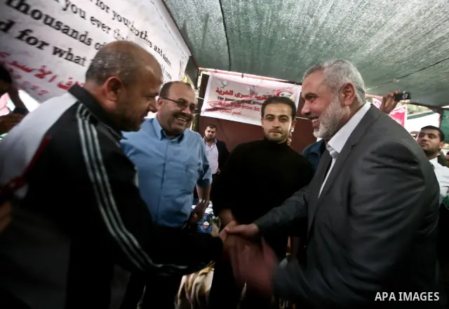 Palestinian Prime Minister in Gaza Ismail Hanyeh, visits Palestinians participat at hunger striking during a sit-in tent held by Palestinian released prisoners, solidarity with Palestinian prisoners held in Israeli jails...