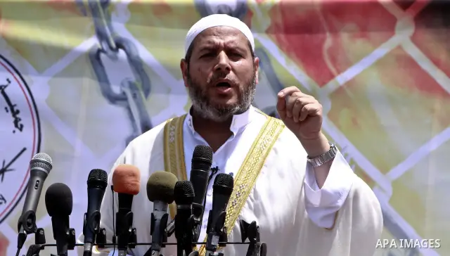 Palestinian Prime Minister in Gaza Ismail Haniyeh (not seen) during the friday prayers at a sit-in tent held by Palestinian released prisoners, solidarity with Palestinian prisoners held in Israeli jails, in Gaza City on...
